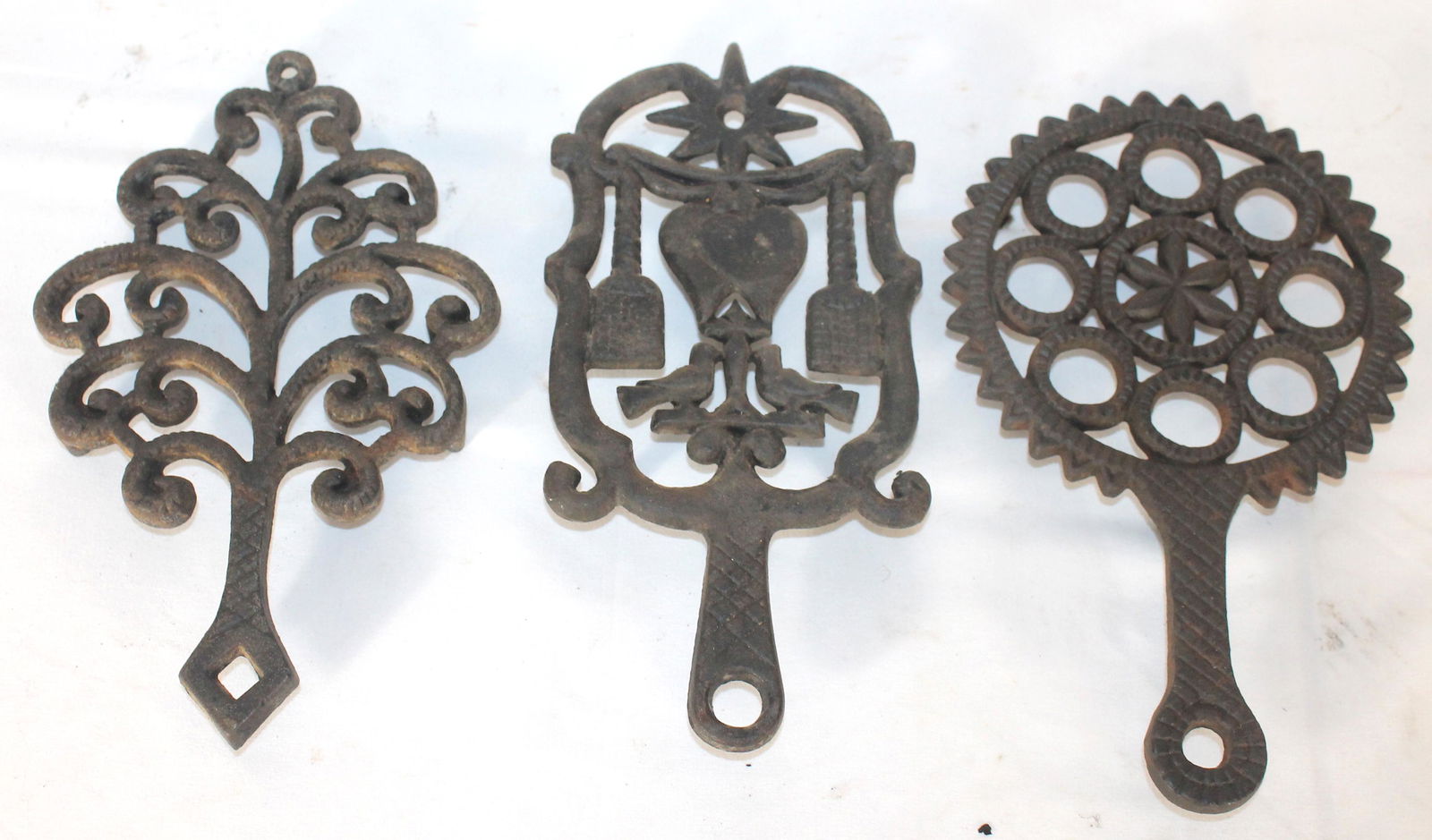 Lot of 3 iron fireplace trivets in various shapes - (1 of 5)
