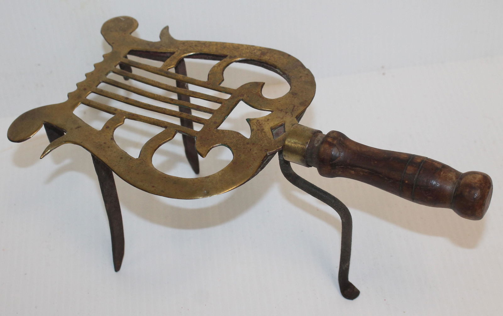 Brass fireplace trivet on legs (1 of 5)