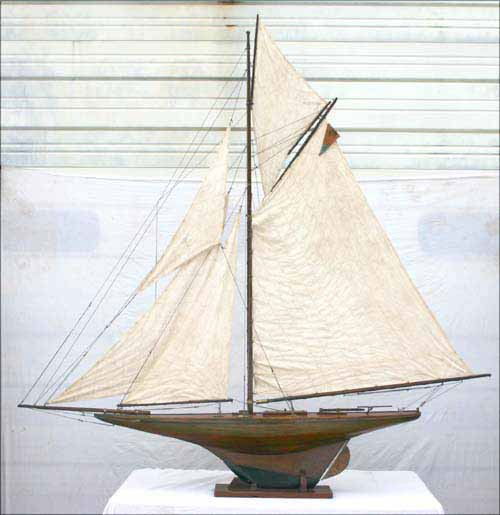 Great Large vintage pond yacht w varnished hull, a: Great Large vintage pond yacht w varnished hull, a full suit of stitched linen sails & many brass fittings - 74" long x 74" tall