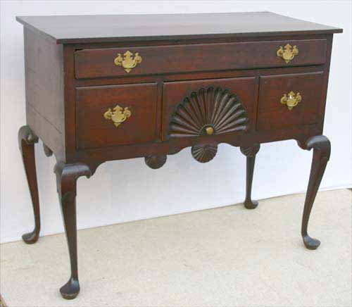 Wonderful & rare form ca 1780 late period QA CT ch: Wonderful & rare form ca 1780 late period QA CT cherry server w carved knees & 6 orig fan & shell carvings in old surface - 43" wide x19 3/4" deep top - 35 1/2" tall - 40" case width