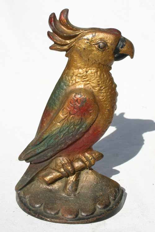 lot of 2 antique cast iron parrot or exotic bird d: lot of 2 antique cast iron parrot or exotic bird doorstops - 9" & 6 1/2" tall