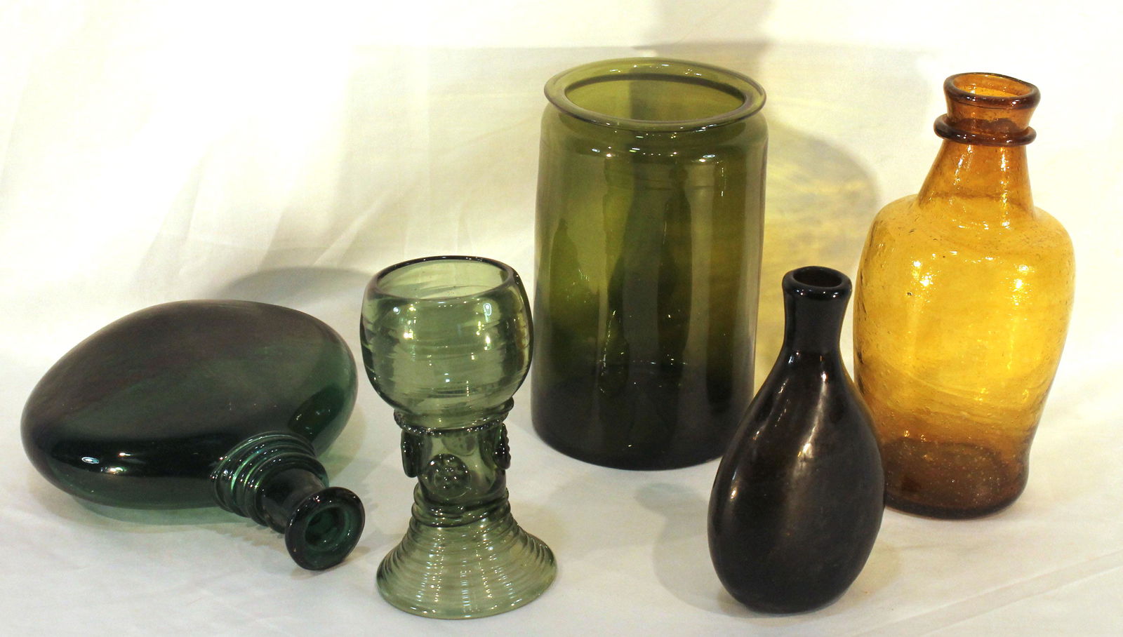 lot of contemporary green & amber glass bottles, jar & goblet - 6 1/2" - 9" tall (1 of 14)