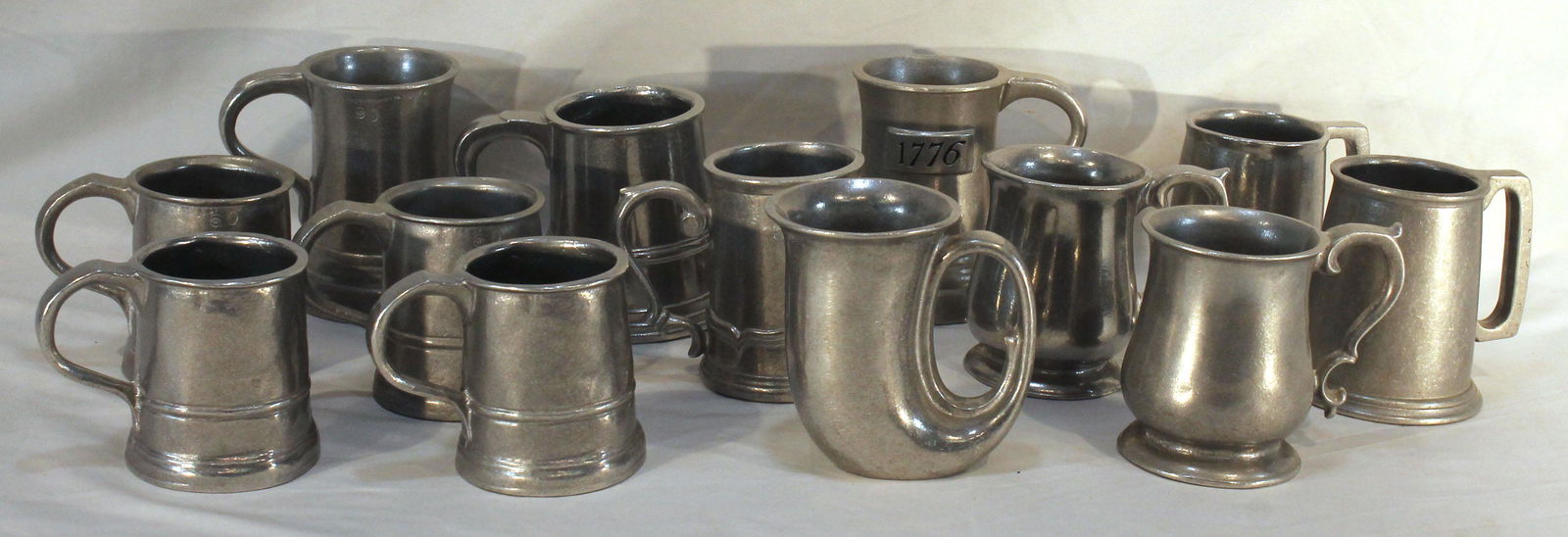 Lot of 13 metalware mugs incl a pr of Wilton Armetale (1 of 9)