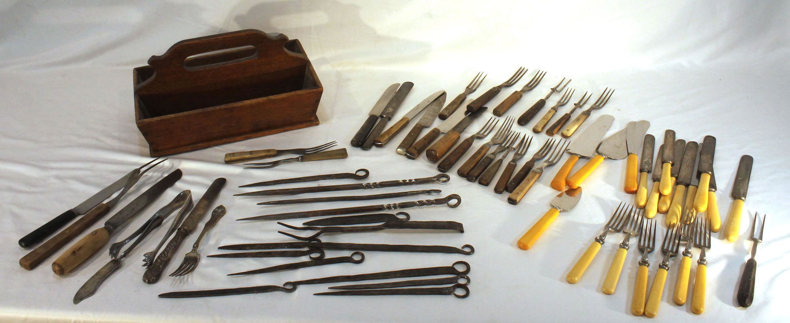 Wooden utensil carrier filled with utensils incl iron spits, wooden handled forks & knives,  a set (1 of 9)