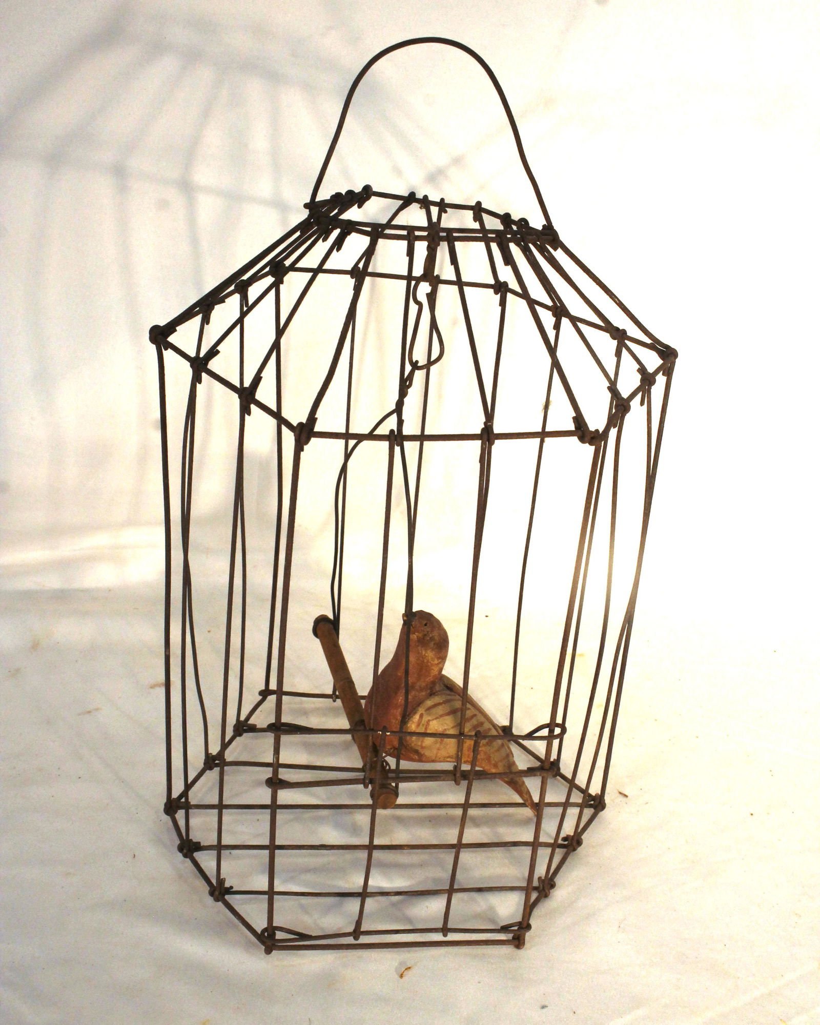 Primitive style wire bird cage w wooden painted bird on perch - 12" tall to top of handle x 7 1/2" (1 of 4)