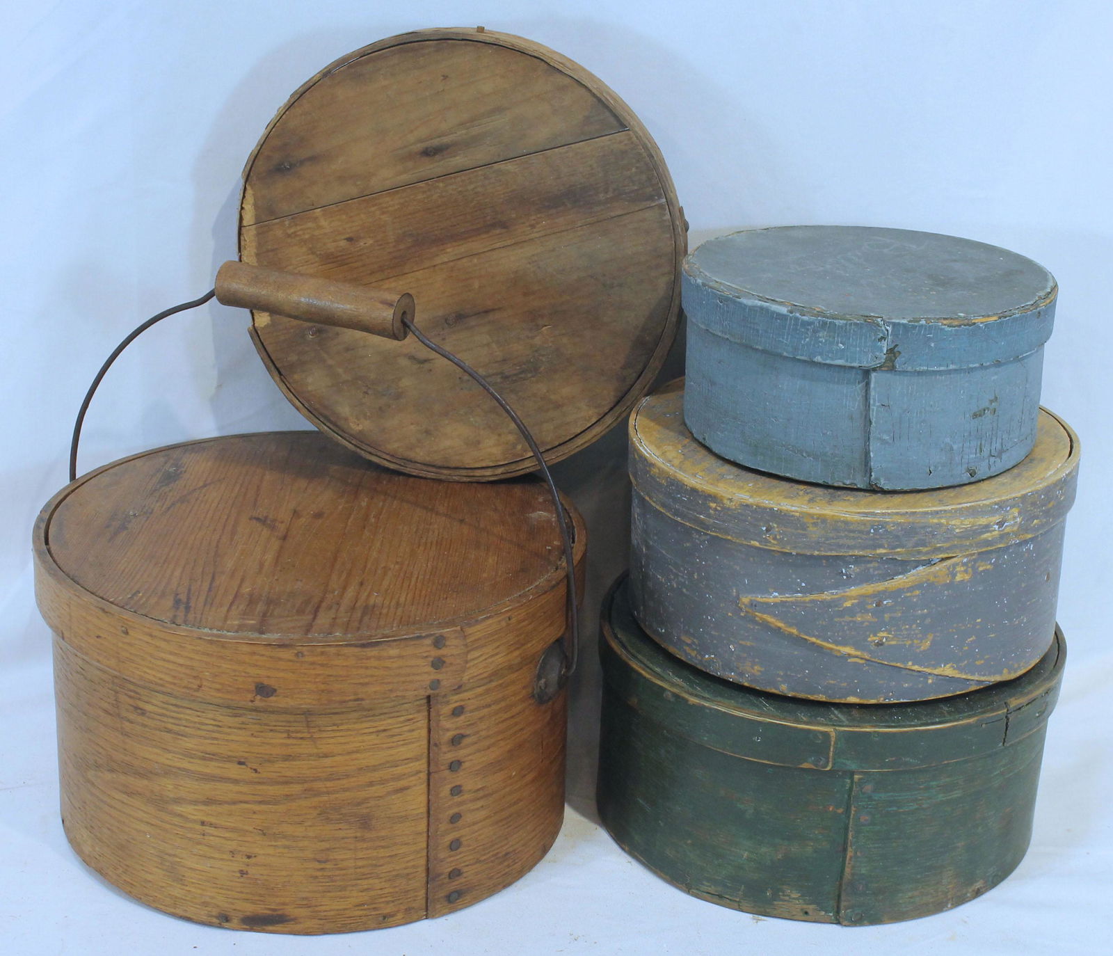 Pantry box lot incl 6 1/2" round in blue; 7 3/4" round 1 finger in gray, 8 1/2" round in green & 9 (1 of 11)