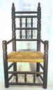 Wonderful form antique style reproduction Carver chair in black paint - 46" tall