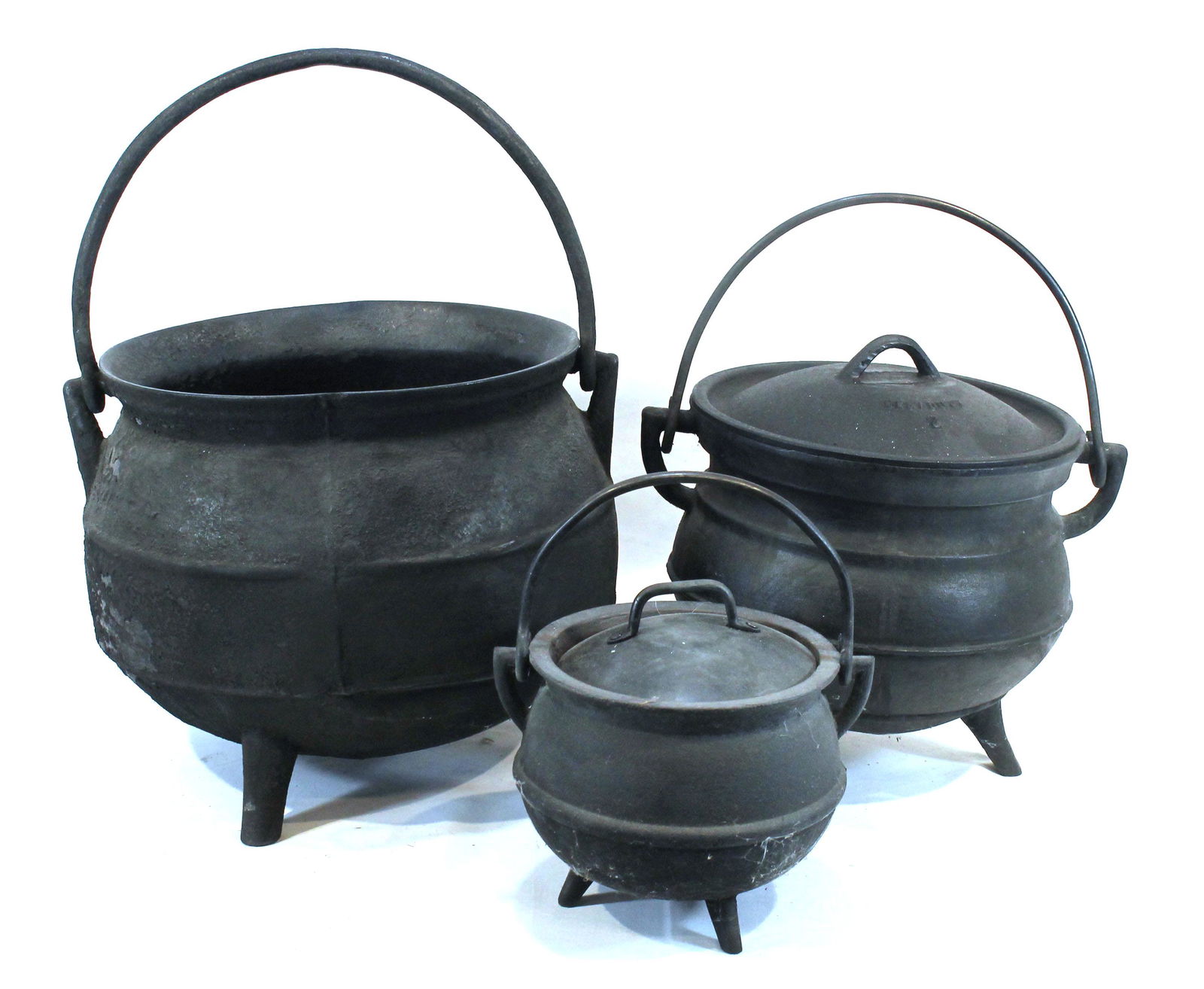 3 cast iron spider cauldrons w swing handles - 2  w lids - approx 12" diam x 10" tall; 9 1/2" diam x (1 of 15)