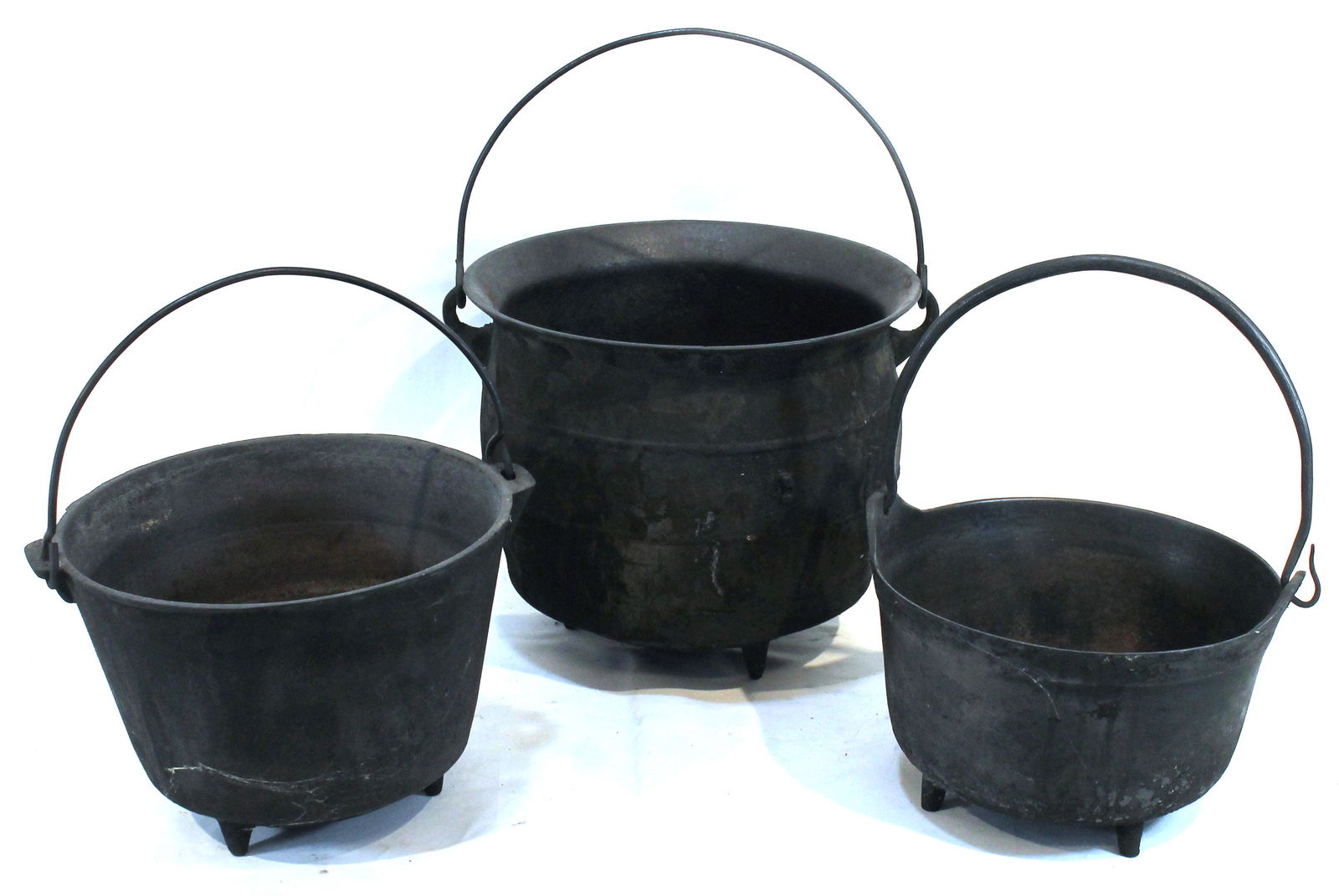 3 cast iron spider cauldrons - 8 1/2" diam x 5 1/4"; 9 1/4" diam x 6 3/4" & 10 3/4" diam x 9 1/4" (1 of 7)