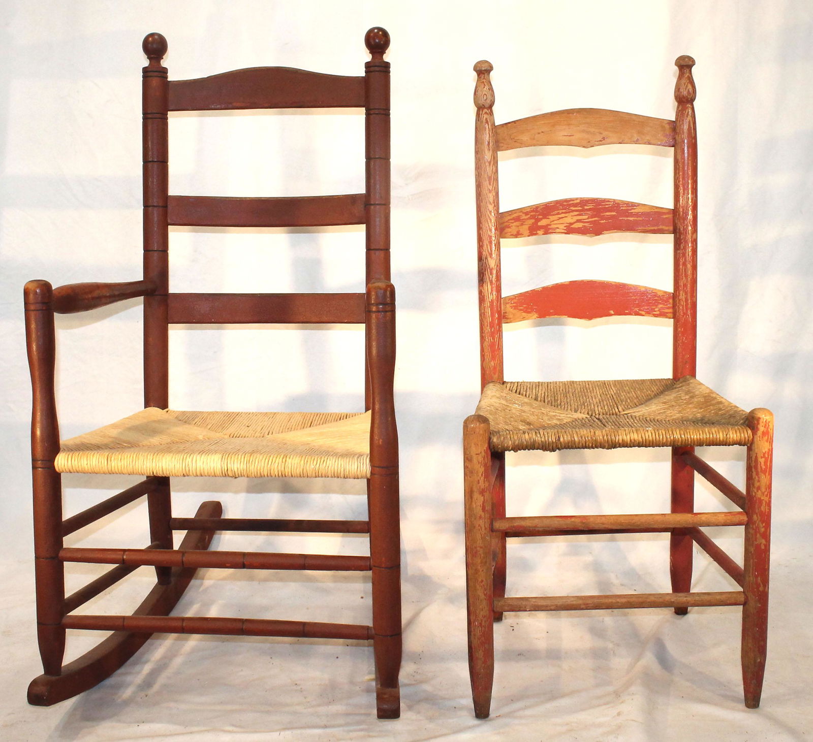 2 antique ladderback chairs w rush seats in traces of red paint incl rocker & sidechair (1 of 8)