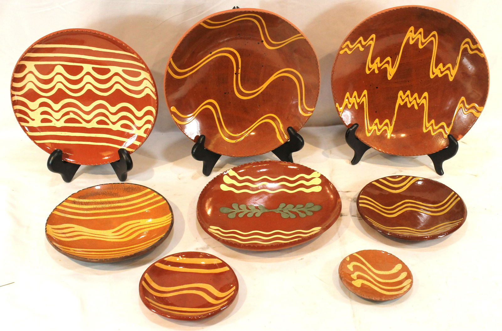 8 contemporary redware slip dec plates - most marked Turtle Creek - 2 by Breninger dated 1988 - 4 (1 of 20)