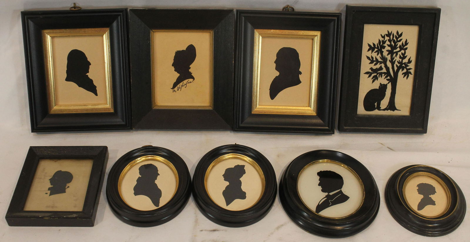 Collection of 9 contemporary primitive style framed silhouettes - incl 1 cut-out - sizes range from (1 of 7)
