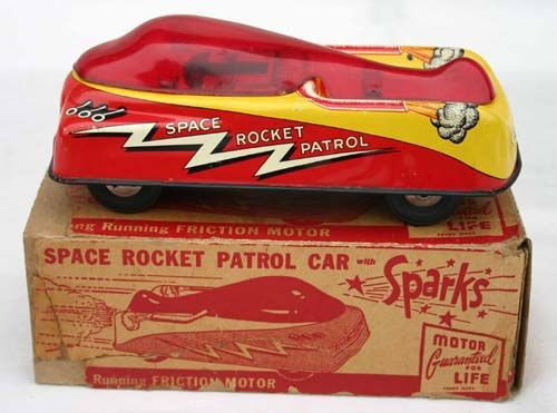 orig boxed Courtland friction 7" space rocket spar: orig boxed Courtland friction 7" space rocket sparking patrol car