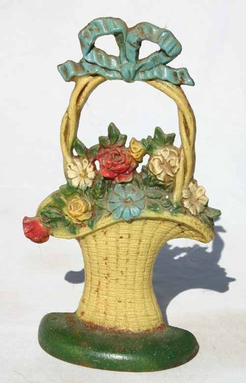 antique cast iron "French Basket" of flowers doors: antique cast iron "French Basket" of flowers doorstop by Hubley - 10 1/2" tall x 6 1/2" wide