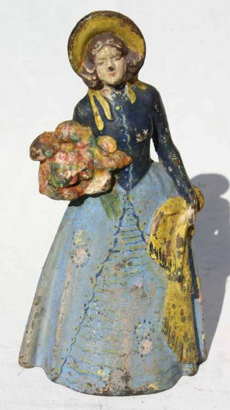 antique cast iron large woman in bonnet w shawl & : antique cast iron large woman in bonnet w shawl & floral bouquet doorstop - 11 3/4" tall
