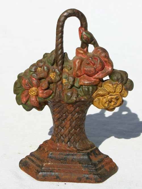 unusually diminutive cast iron "Basket of Flowers": unusually diminutive cast iron "Basket of Flowers" doorstop by Hubley - 7" tall