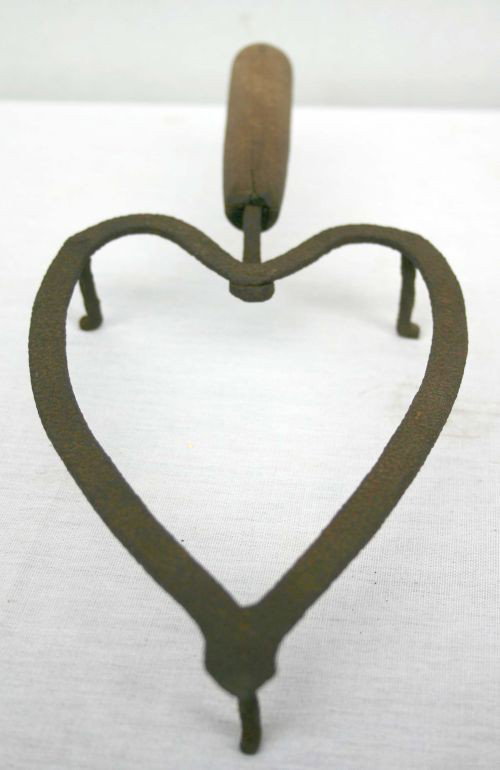 ca 1800 New England heart shaped iron trivet w woo: ca 1800 New England heart shaped iron trivet w wood handle