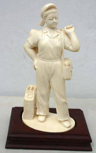 Fine carved Chinese ivory figure w jacket slung ov: Fine carved Chinese ivory figure w jacket slung over her shoulder in overalls carrying a tool bag w jerry can beside her - signature on wooden base - 7" tall