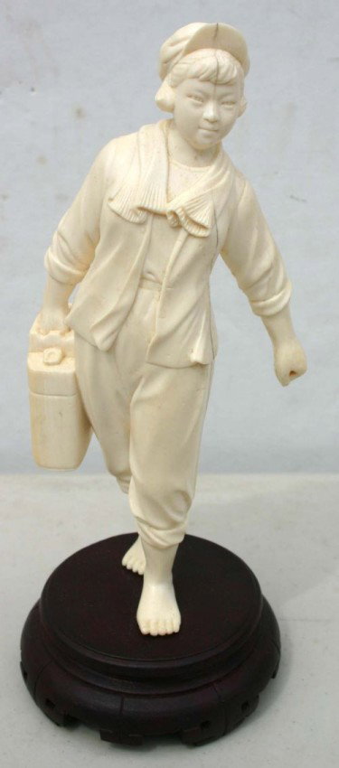 Chinese carved ivory figure of a barefoot girl w s: Chinese carved ivory figure of a barefoot girl w sweater & cap carrying a jerry can - 6" tall