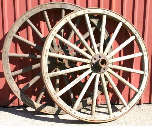 Excellent pr of antique wood & iron wagon wheels