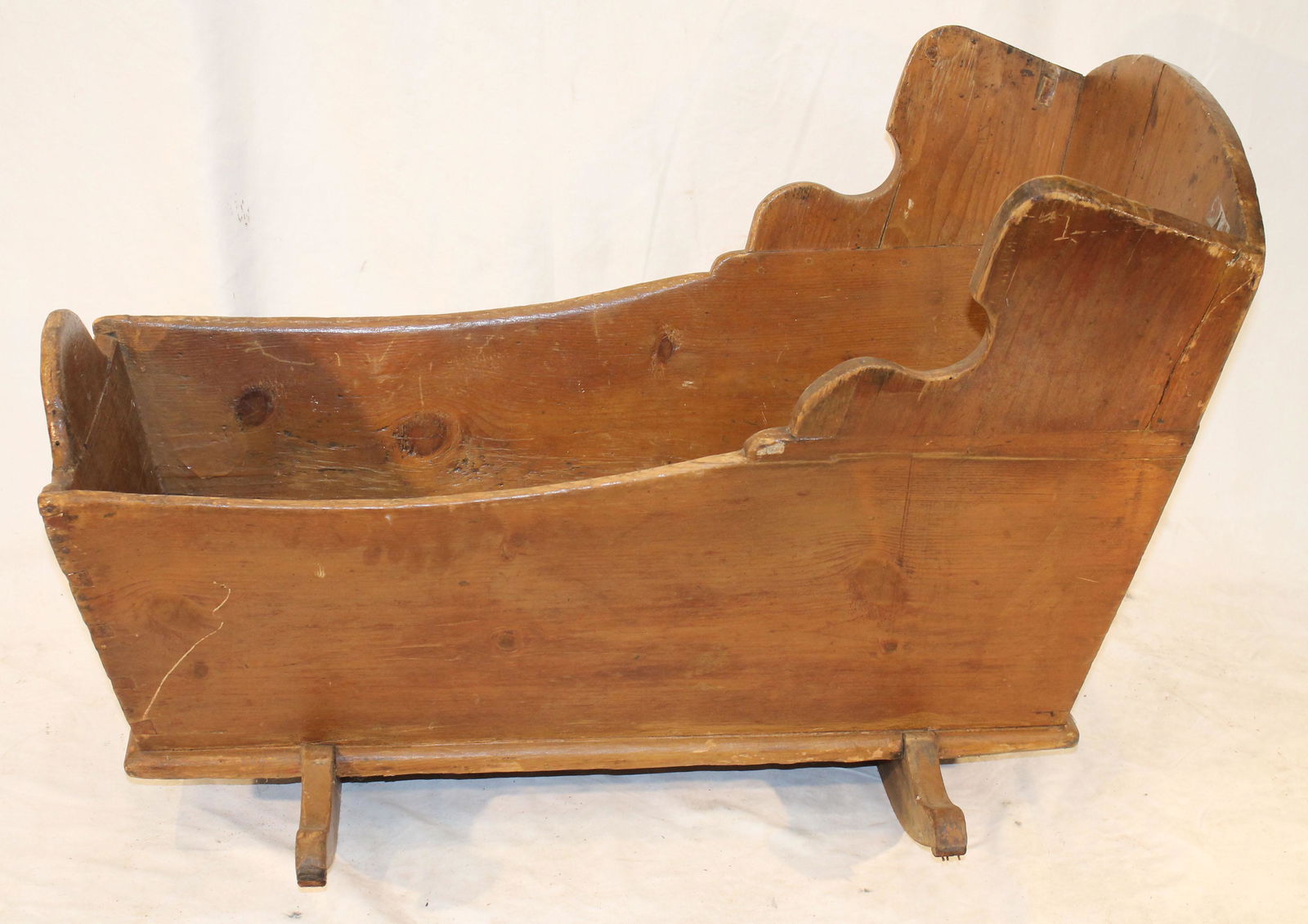 Antique wooden cradle - 34 1/2" long x 23" tall x 22" wide (at rockers) (1 of 2)