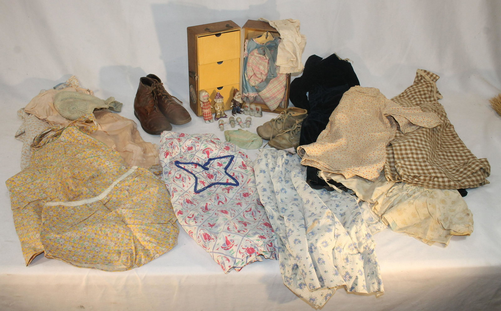 Textile lot of children's clothes incl velvet coat,etc & 2 pairs of leather shoes plus a doll's (1 of 5)
