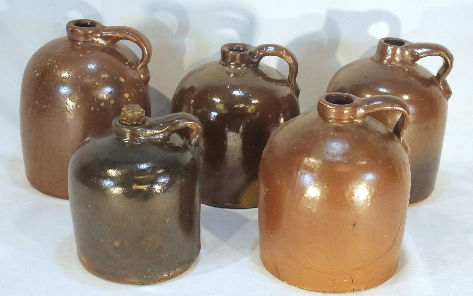 Collection of 5 midwestern stoneware sorgham jugs - 6", 7", 7 1/2", 8" tall (1 of 10)