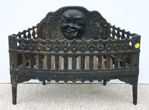 Lot: 361: antique cast iron ftd fireplace grate w moon face