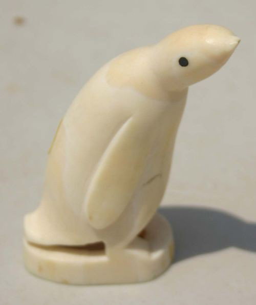 Whale's tooth carved 4" tall penguin w baleen eye: Whale's tooth carved 4" tall penguin w baleen eyes