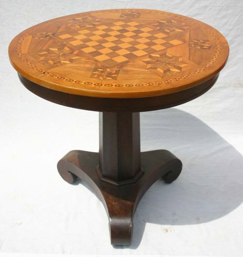 antique checkerboard & multi inlaid table on pedest: antique checkerboard & multi inlaid table on pedestal base ending in elephant trunk tripod feet - 31" diam top