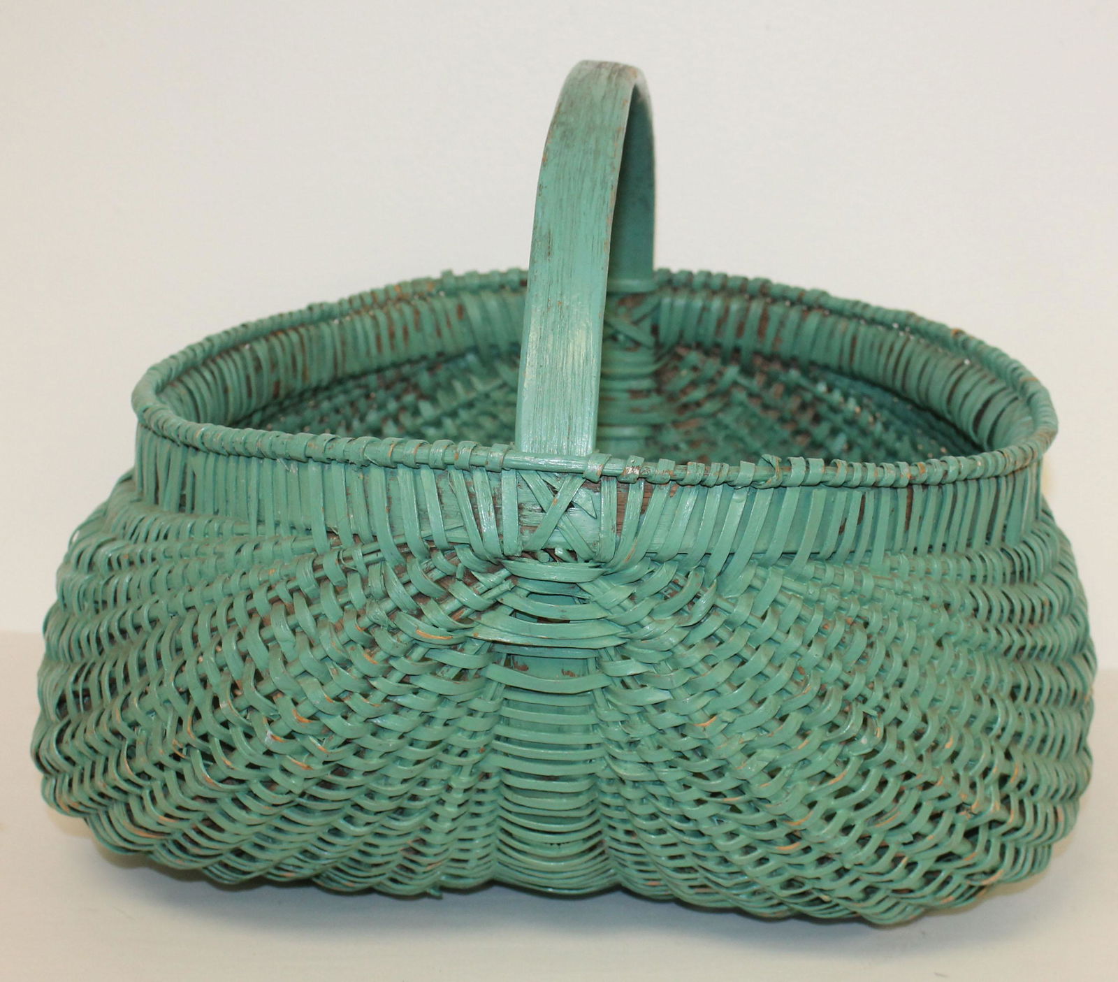 Large buttocks basket in green paint - approx 17" long x 12" to top of handle (1 of 4)