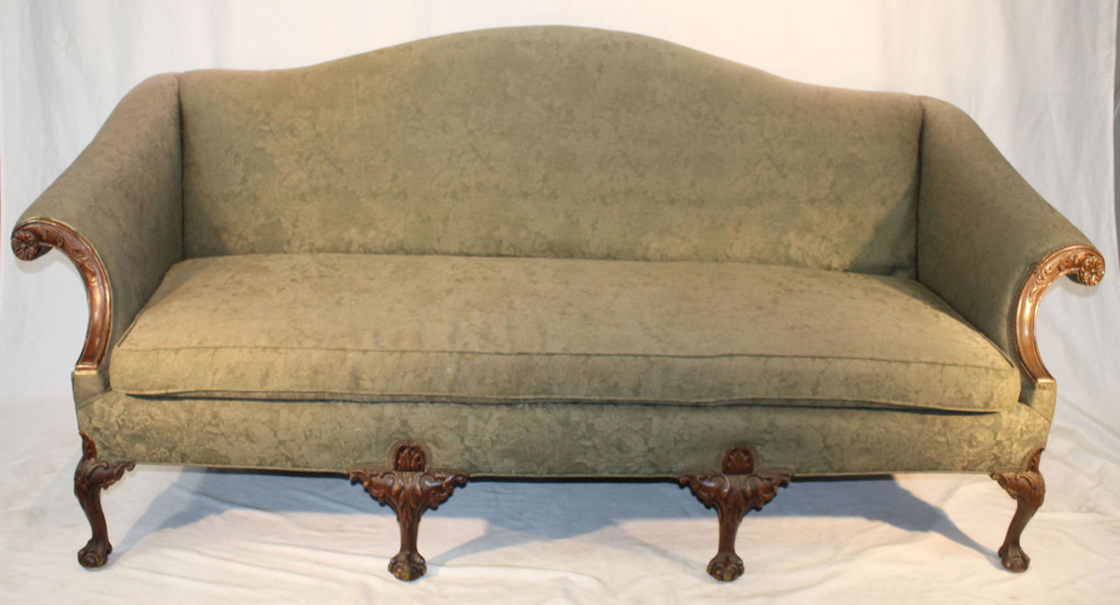 Antique carved walnut sofa on ball & claw feet in green upholstery - 84" wide x 35" tall (1 of 8)