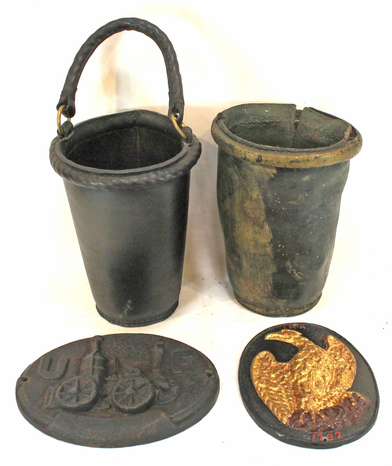 Firefighter related lot incl 2 reproduction leather fire buckets & 2 reproduction cast iron fire (1 of 8)