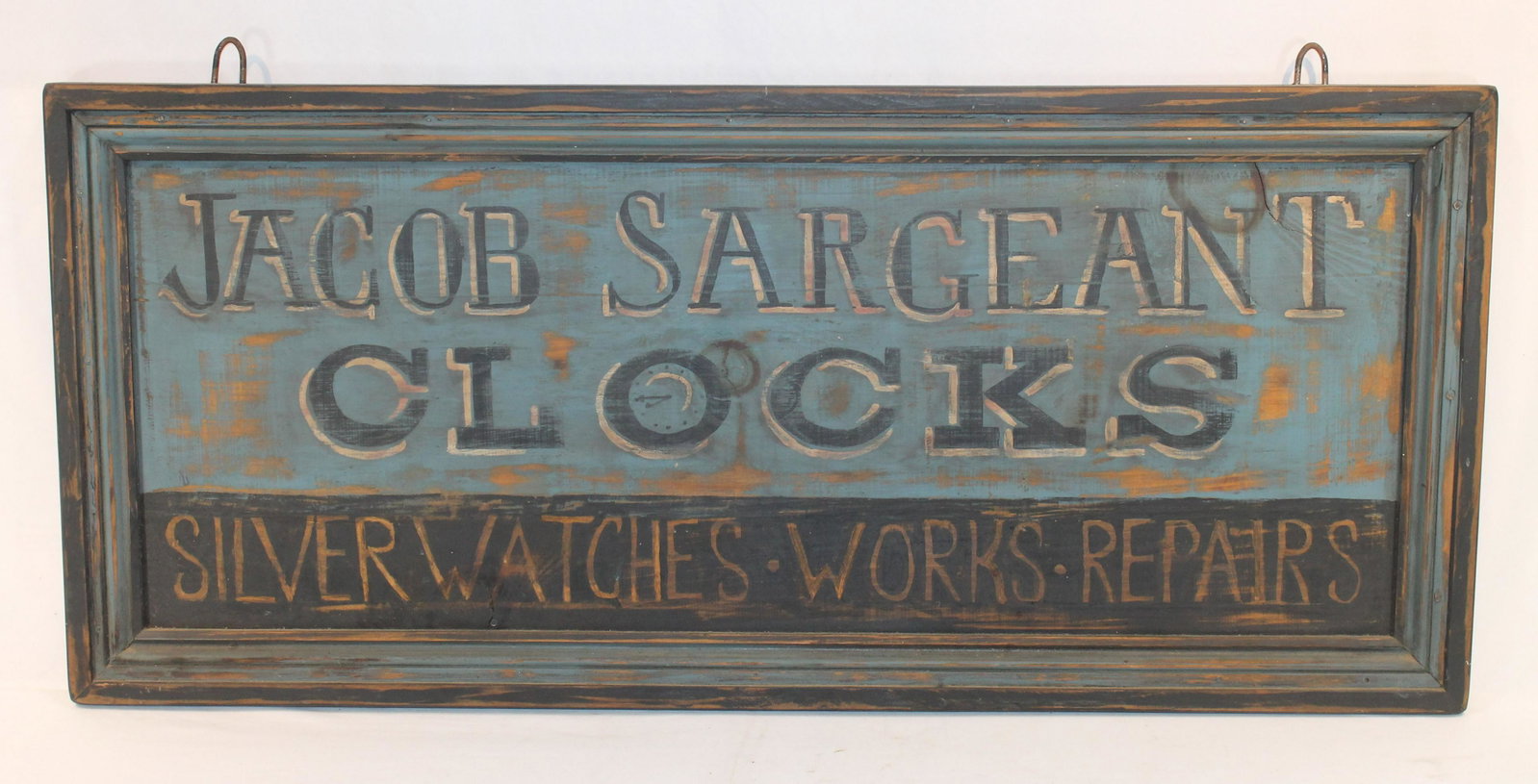 Jacob Sargeant Clocks" wooden painted single sided trade sign - 19"x43 1/2: Jacob Sargeant Clocks" wooden painted single sided trade sign - 19"x43 1/2