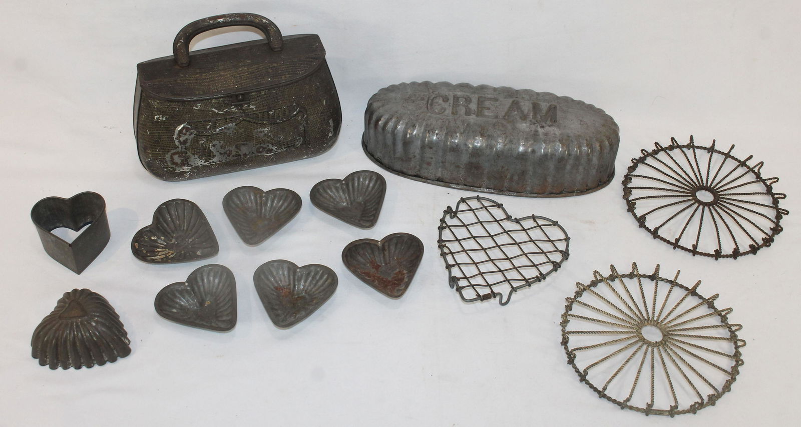 Misc kitchen lot of tin food molds & wire trivets (1 of 6)