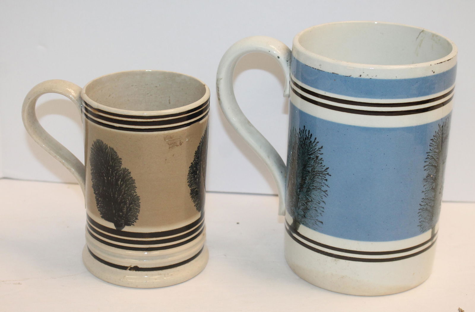Lot of 2 Mochaware Mugs with Seaweed Decoration. Brown banded with faint 1" hairline at top, 5" (1 of 5)