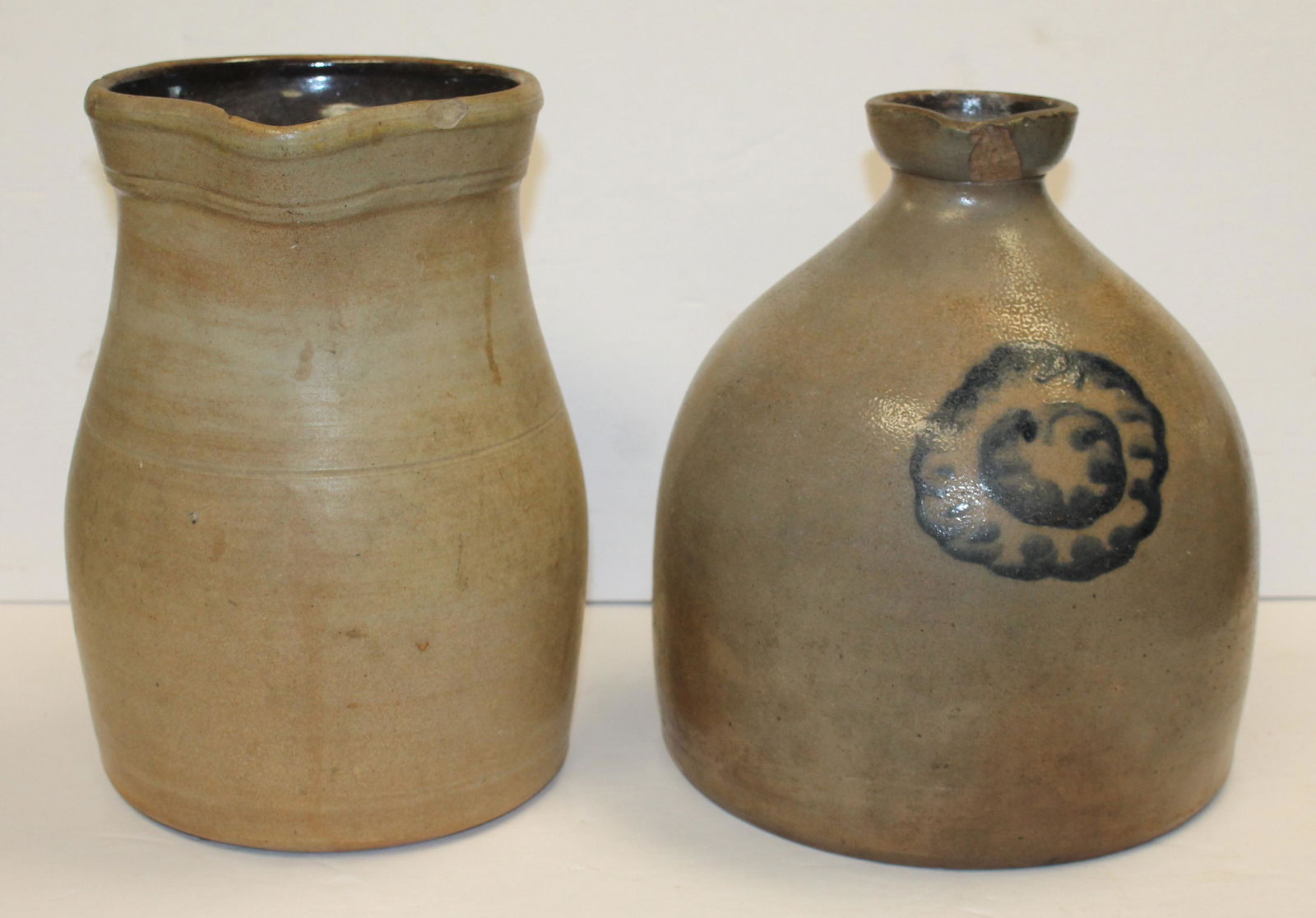 Lot of 2 stoneware pitchers - 1 w cobalt dec - 9 1/2" & 10" tall - both in as found condition (1 of 13)