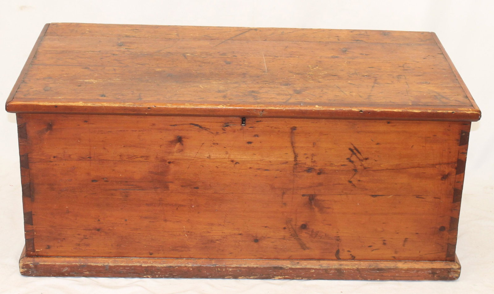 Antique dovetailed blanket chest in stained finish w iron handles - 19" tall x 44" wide x 22 1/4": Antique dovetailed blanket chest in stained finish w iron handles - 19" tall x 44" wide x 22 1/4" deep