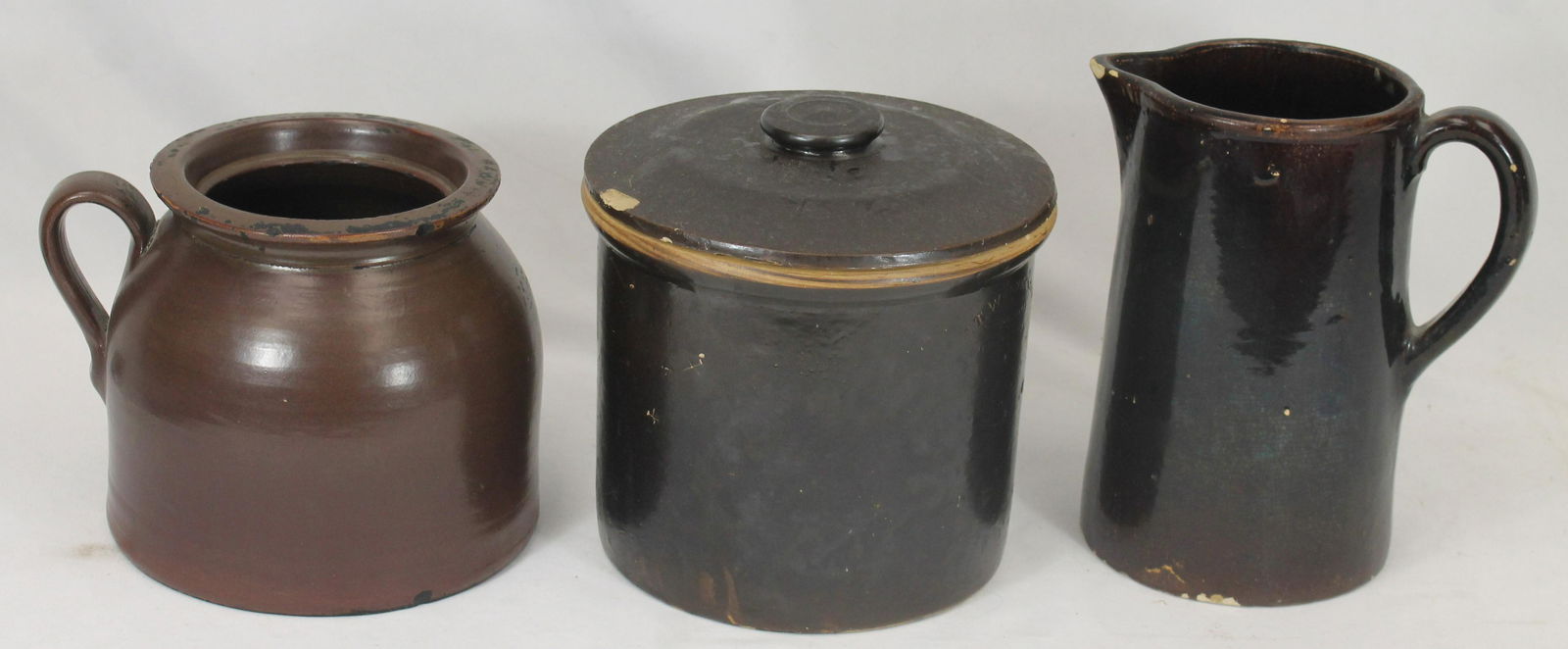 Lot of 3 antique stoneware items in brown glaze incl a pitcher, jar & crock (with cover) - crock is (1 of 10)