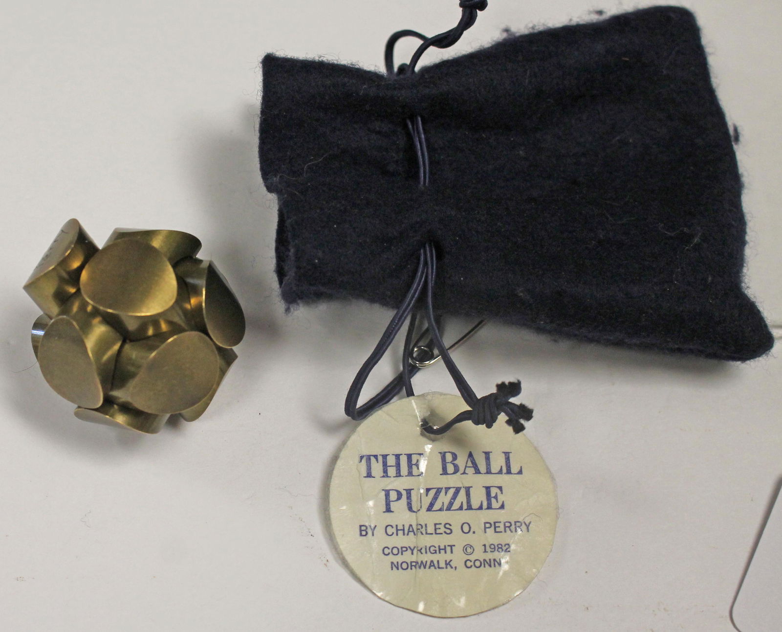Charles O. Perry "The Ball Puzzle" ca 1982 - complete w orig tag & felt bag: Charles O. Perry "The Ball Puzzle" ca 1982 - complete w orig tag & felt bag