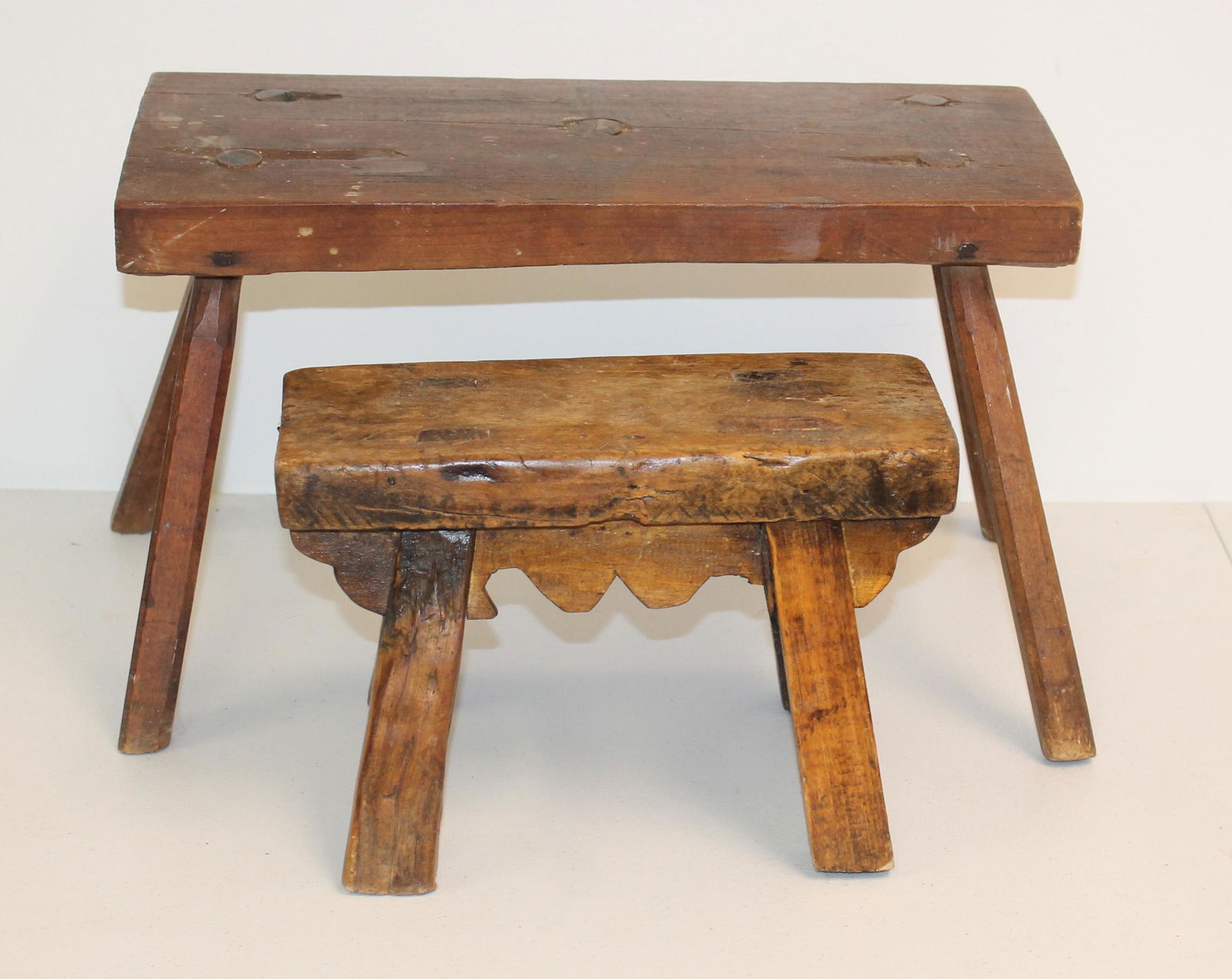 Lot of 2 carved wooden foot stools on splayed legs - 11"x5"x7" tall & 16 1/4"x7 1/4" x 9 1/2" tall (1 of 6)