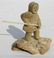 47: Eskimo figural whale bone & ivory carving of an esk