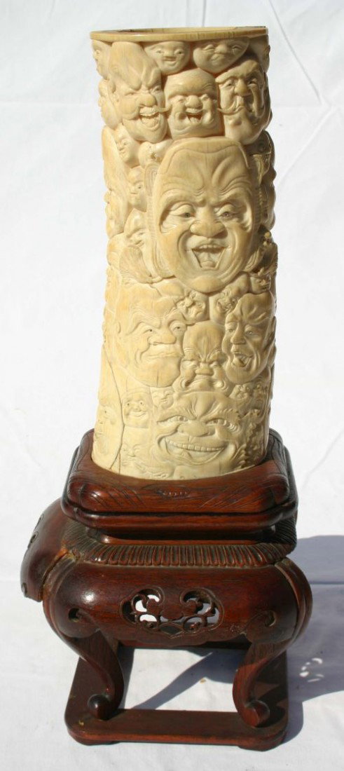 very old 1000 Faces tusk vase w the faces of numer: very old 1000 Faces tusk vase w the faces of numerous figures such as Daruma, Ebisu, Hotei, Oni, Hannya, Okina and others, some eyes are inlaid in shell - 9" tall ivory - 15" overall - Great!