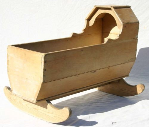 early period dovetailed cradle in desirable old wa: early period dovetailed cradle in desirable old wax surface - 36" long x 25 1/2" tall