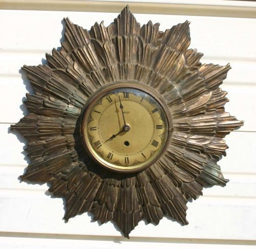 ca 1890 Starburst form gilded metal wall clock (no: ca 1890 Starburst form gilded metal wall clock (now fitted w quartz movement) - 14" diam
