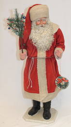 Large Artisan Kathy Patterson Santa candy container - holding a feather tree in one hand and a