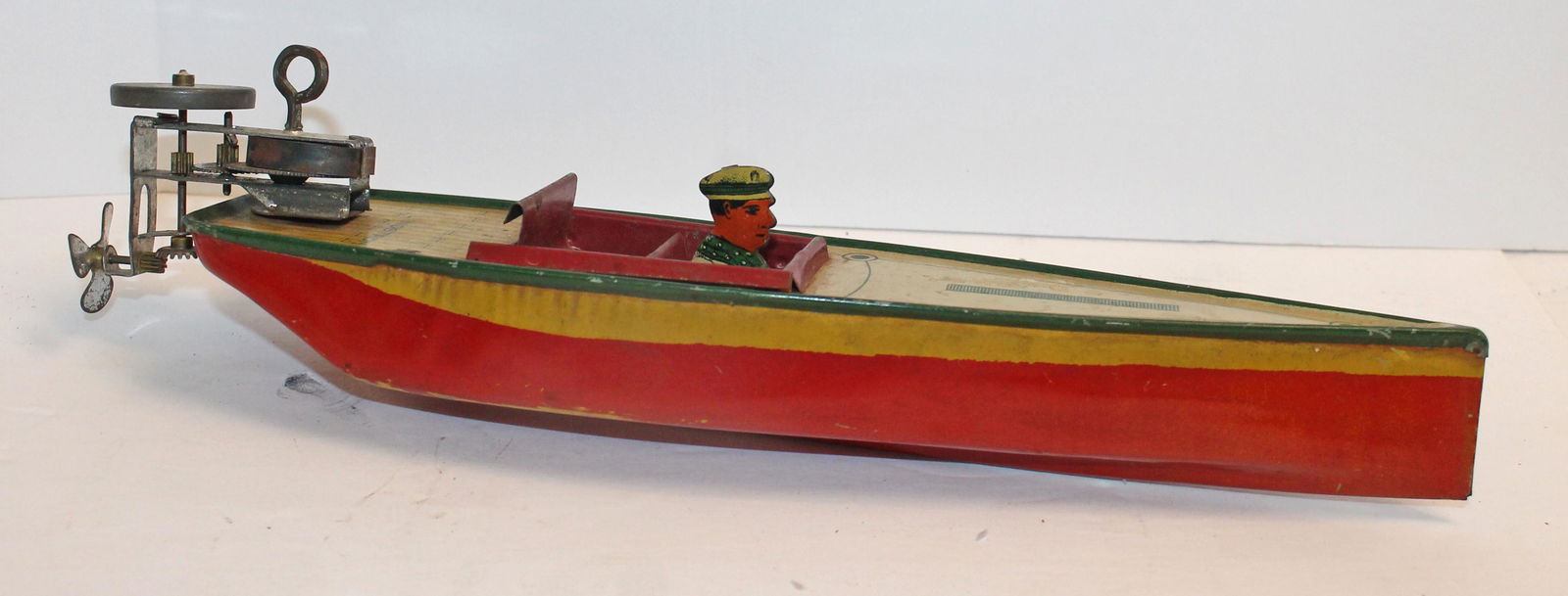 Lindstrom tin wind-up boat w driver - 10 3/4" long (1 of 5)