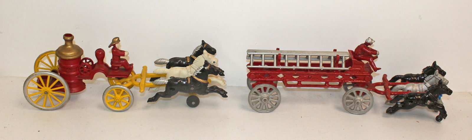 Lot of 2 reproduction cast iron horse drawn fire pumper & ladder truck - (1 of 9)