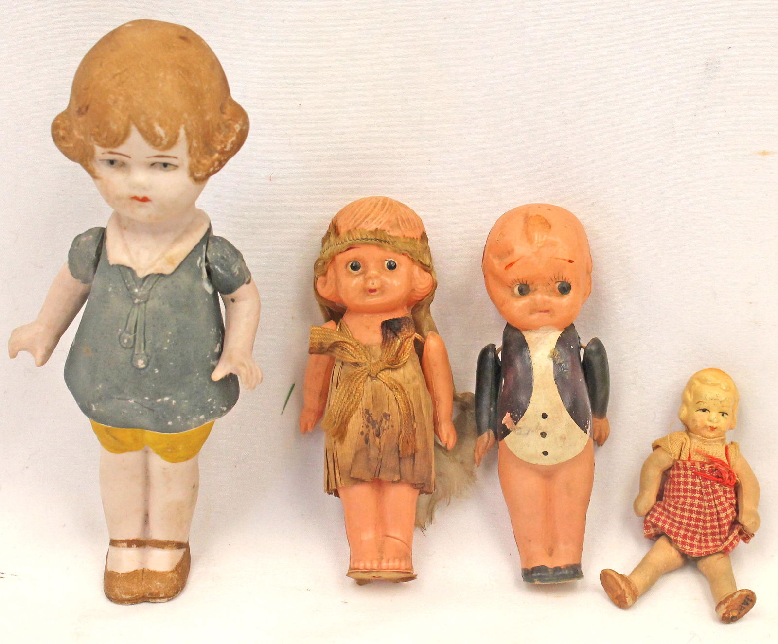 Lot of 4 miniature dolls incl 3 3/4" celluloid bride & groom, 5 1/2" bisque w moveable arms & 2 3/4" (1 of 8)