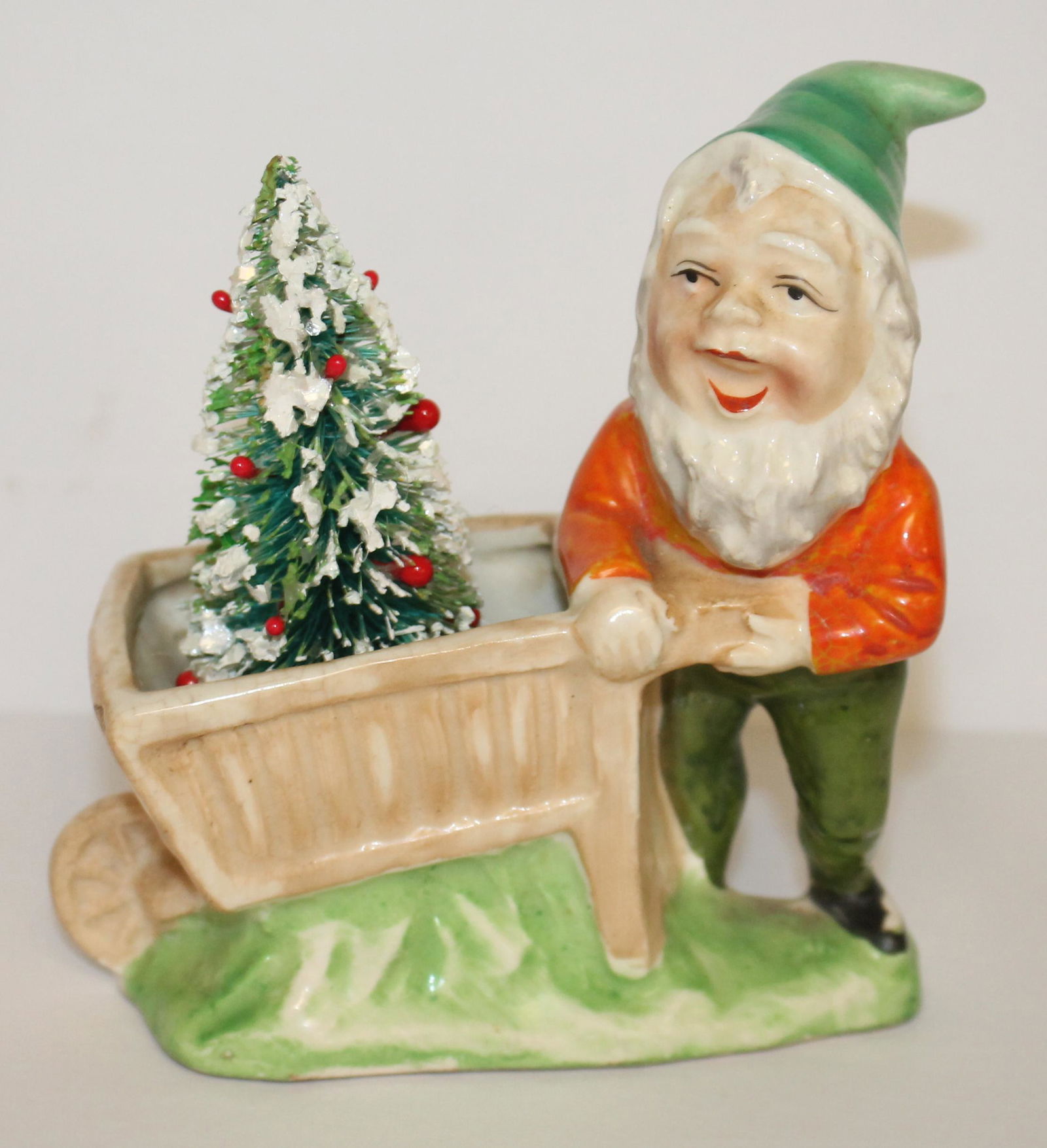 Vintage pottery Christmas elf pushing a wheelbarrow w a small bottle brush Christmas tree - 5" tall (1 of 3)